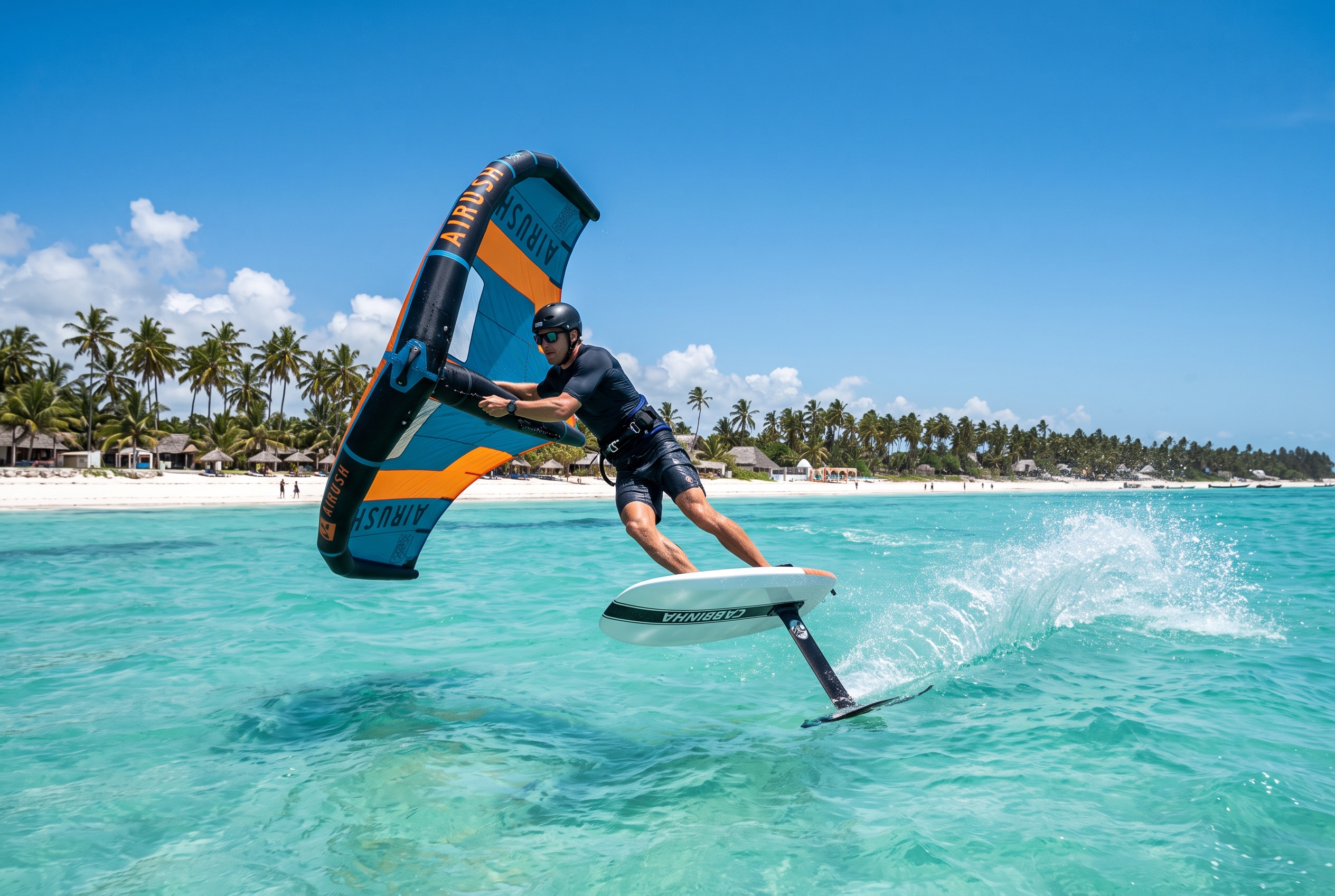 Wing foiler riding a hydrofoil with an inflatable wing across the turquoise Paje lagoon in Zanzibar, Tanzania